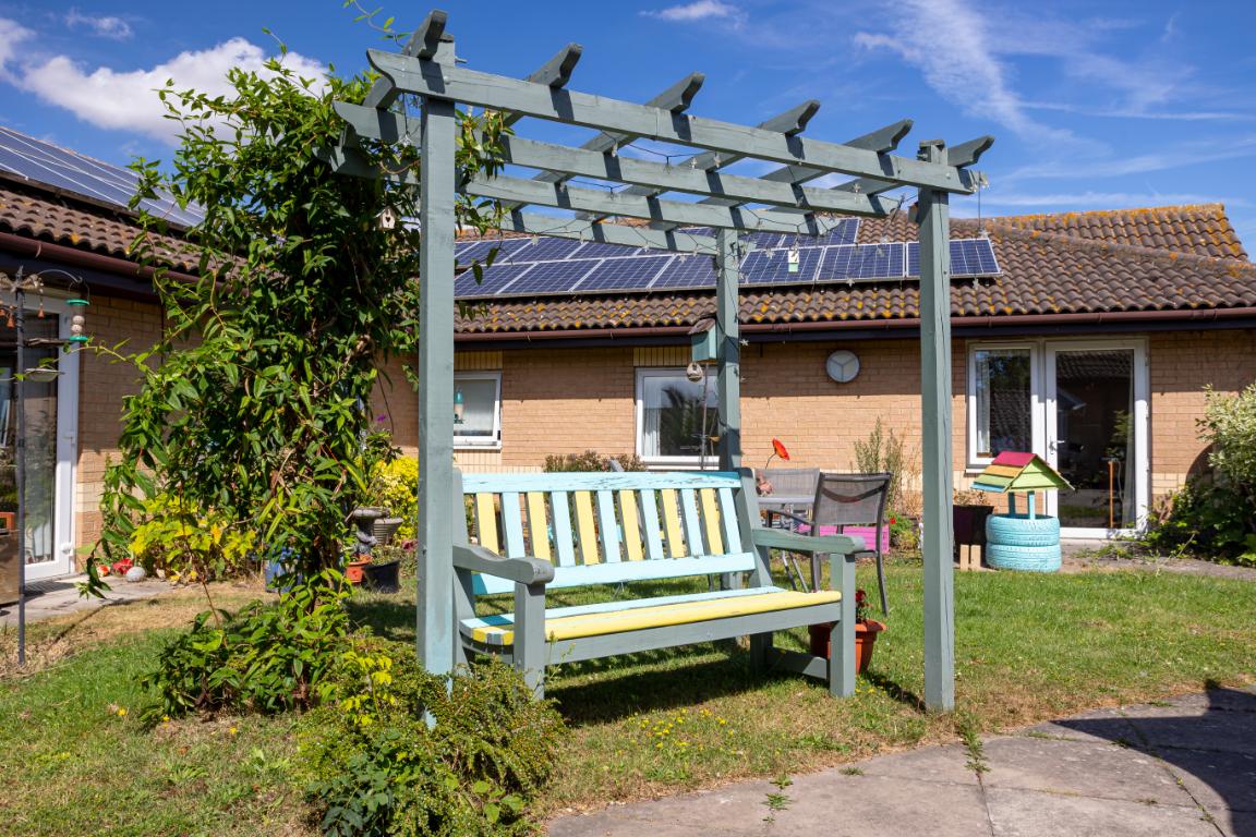 colourful bench in garden